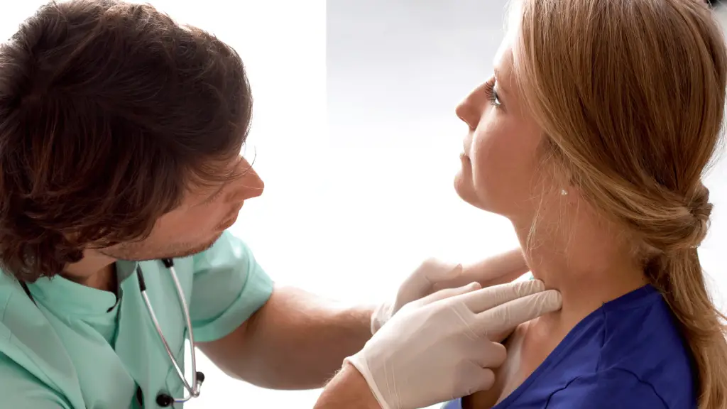 Doctor checking lymph nodes