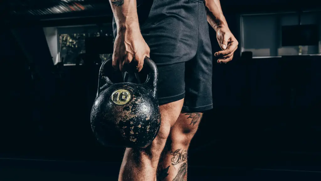 Man holding kettlebell