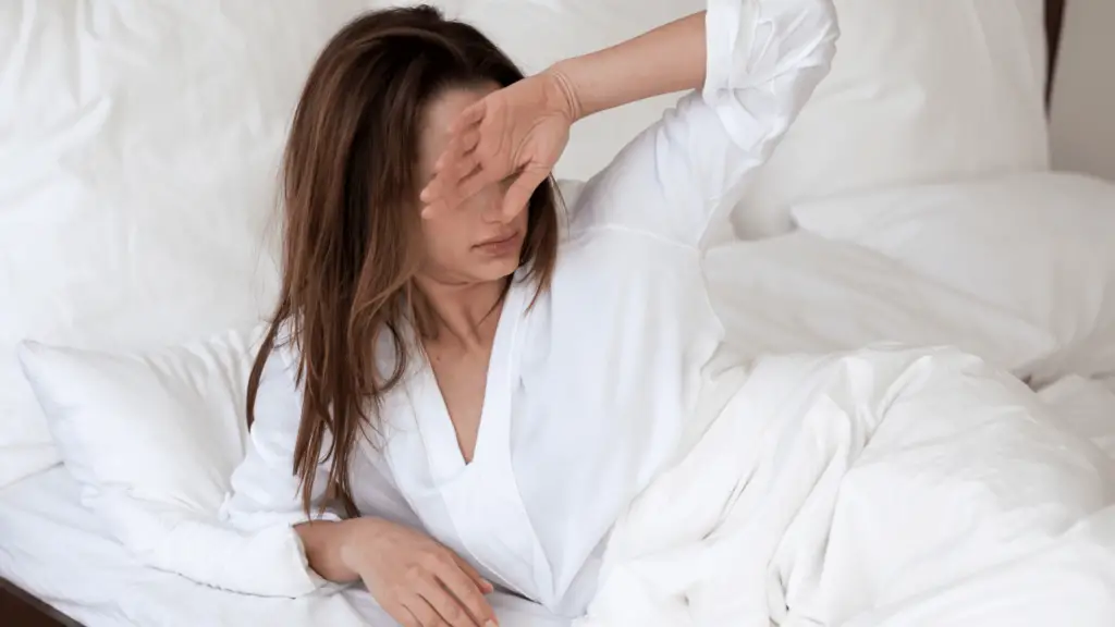 Woman waking up groggy