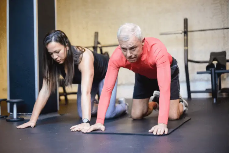 a personal training with an old person