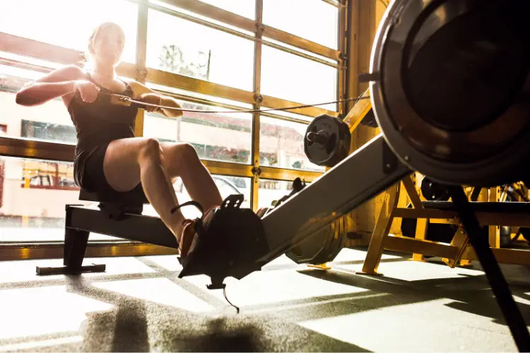 exercising on rowing machine