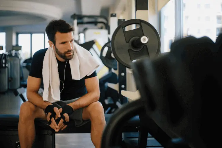 A man in the gym in the early morning