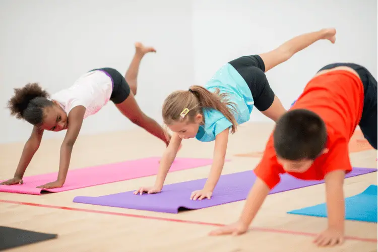 3 children doing an exercise 