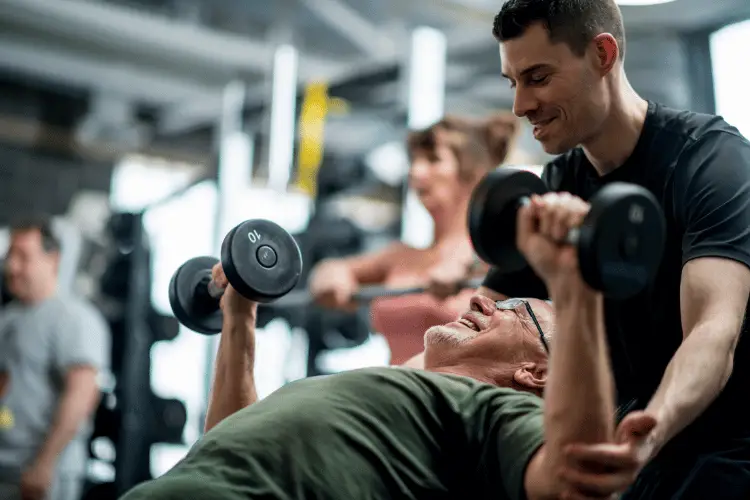 a personal trainer with his client