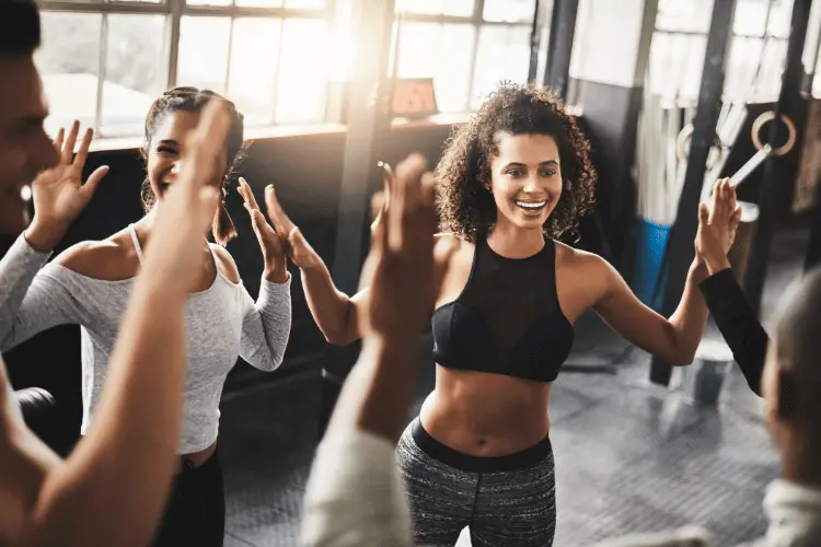 a group of people in a Zumba class 