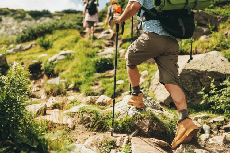 a man hiking a mountain close up