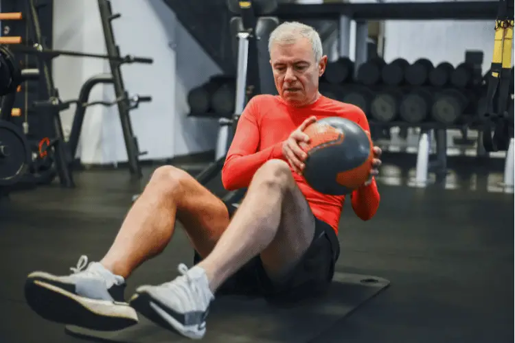 a man doing aerobic exercises