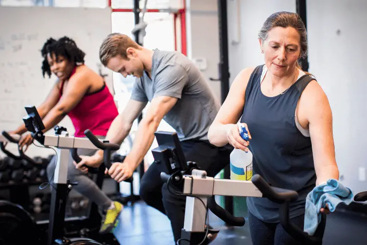 an old woman cleansing gym machines 