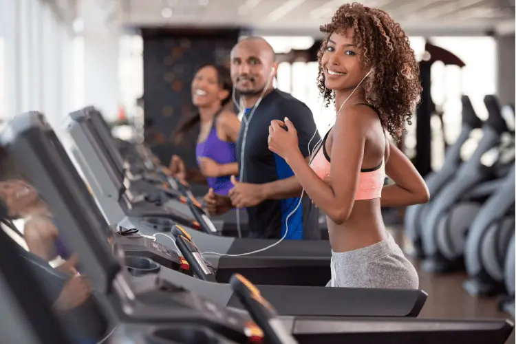 group of people working out in a gym