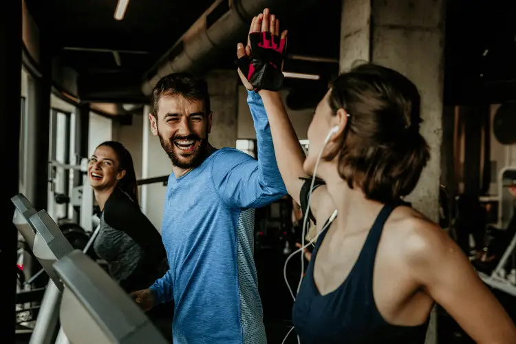 a group of happy people 
working out 