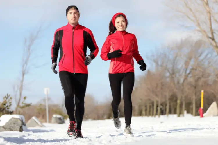 Two runners exercising in winter